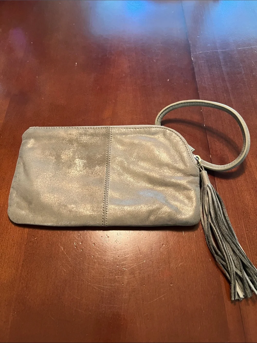 HOBO Metallic Silver Wristlet Clutch with Tassel